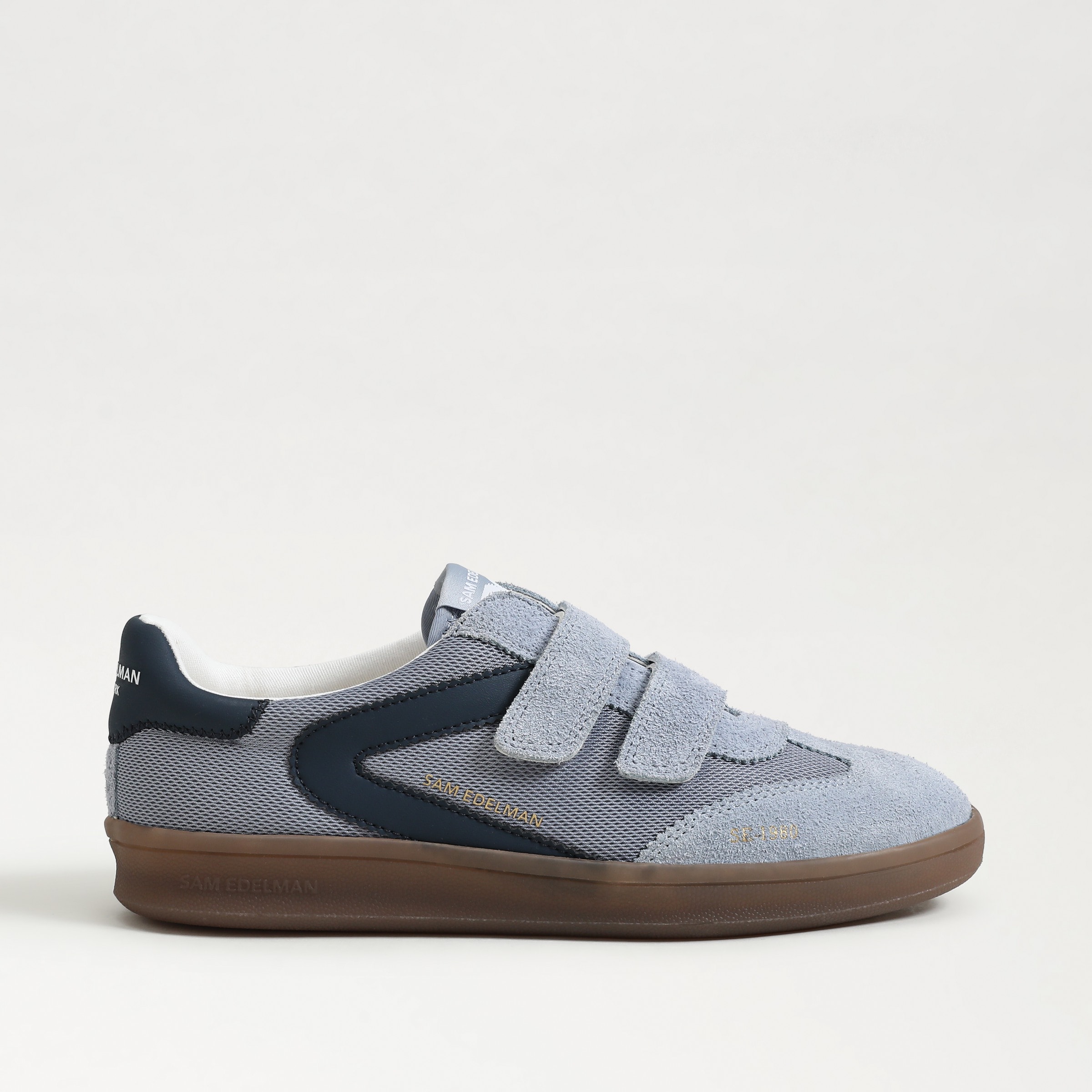 sneakers featuring the talia in midnight blue