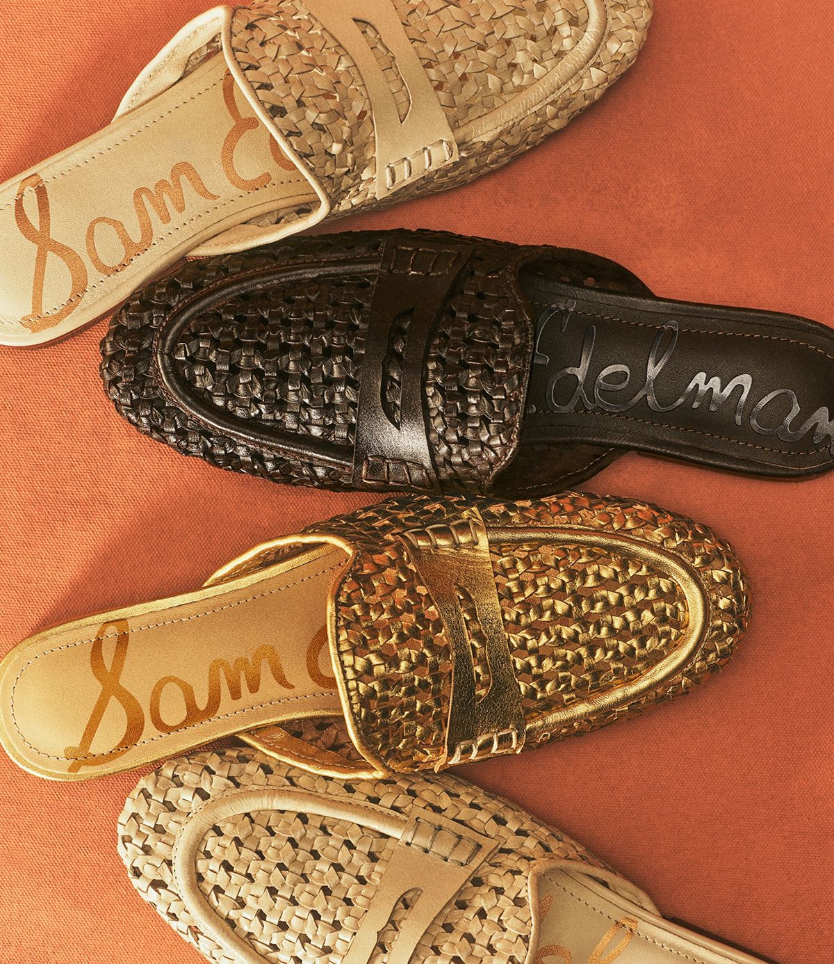 Four Sam Edelman Tullie Woven Mules in white, metallic gold, and black with penny loafer straps.